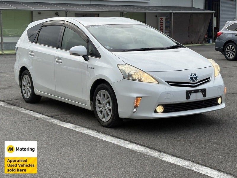2012 Toyota Prius Alpha Hybrid /