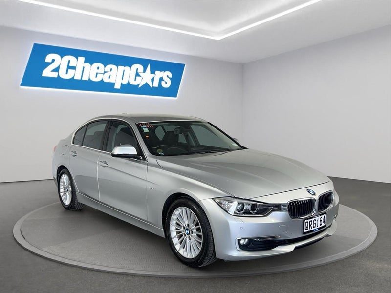 2012 BMW 320i Luxury, photo 3